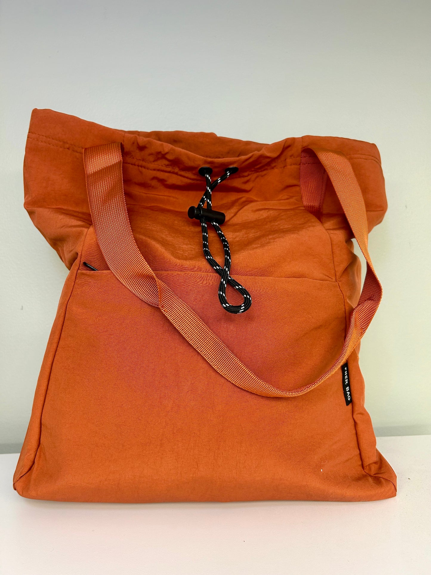 Tag Along Drawstring Tote Bag