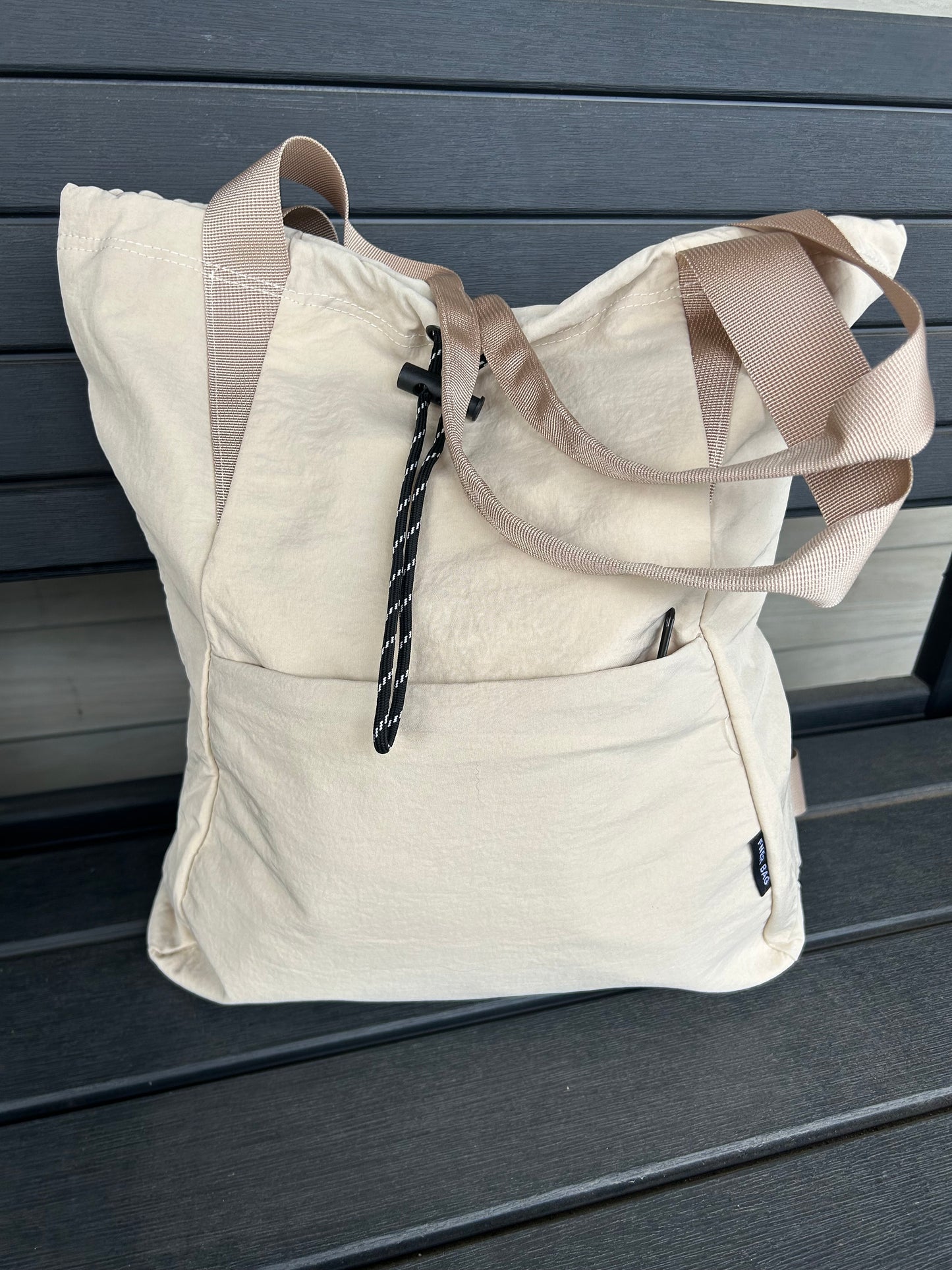 Tag Along Drawstring Tote Bag